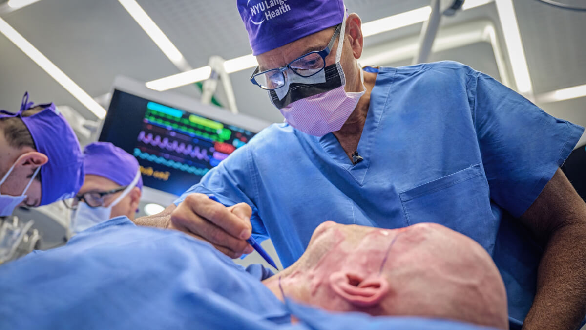 Photo of a surgeon operating on the patient
