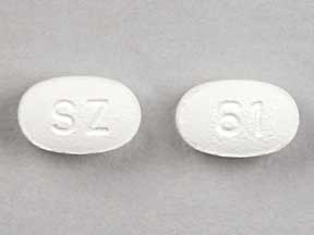 Pill SZ 61 White Oval is Carvedilol