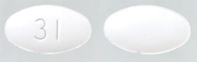 Pill 31 White Oval is Alendronate Sodium