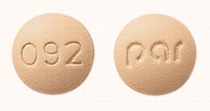 Pill par 092 Orange Round is Doxycycline Monohydrate