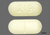 Pill 219 Yellow Capsule-shape is Choline Magnesium Trisalicylate