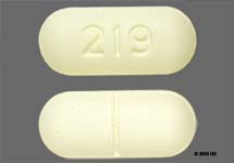 Pill 219 Yellow Capsule/Oblong is Choline Magnesium Trisalicylate