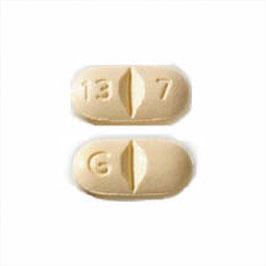 G 13 7 Pill Images Yellow Elliptical Oval