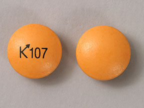 Pill K107 Orange Round is Aspirin Enteric Coated