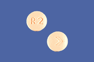 Pill R2 > Tan Round is Risperidone