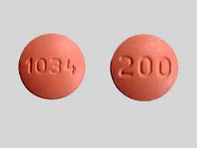 Pill 1034 200 Peach Round is Topiramate