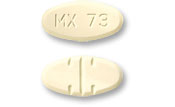 Pill MX 73 Yellow Oval is Trazodone Hydrochloride