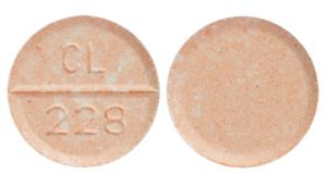 Pill CL 228 is Aceta-Gesic acetaminophen 325 mg / phenyltoloxamine 30 mg