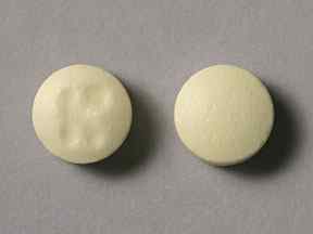 Pill K Yellow Round is Aspirin Delayed Release