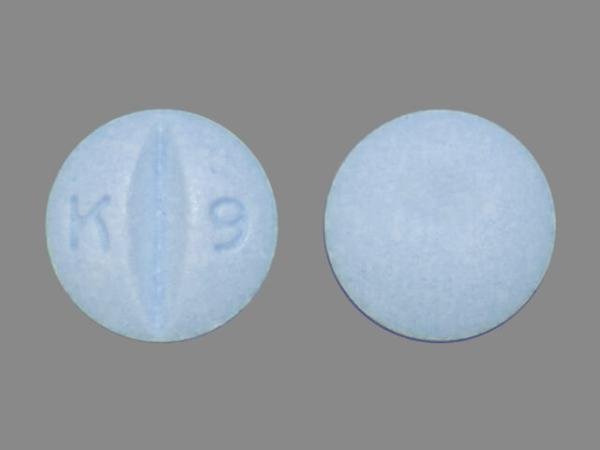 Pill K 9 Blue Round is Oxycodone Hydrochloride