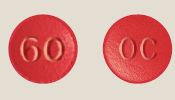 Pill OC 60 Red Round is OxyContin