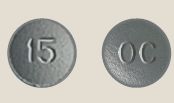 Pill OC 15 Gray Round is OxyContin