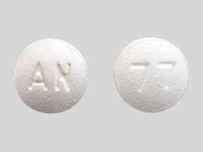 AN 77 Pill White Round 7mm - Pill Identifier