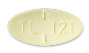 Pill TL 121 Tan Oval is Meclizine Hydrochloride