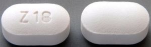 Pill Z18 White Capsule/Oblong is Losartan Potassium