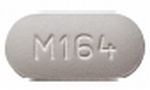 Pill M164 White Capsule/Oblong is Voriconazole