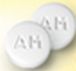 Pill AM is Bayer AM Extra Strength 500 mg / 65 mg