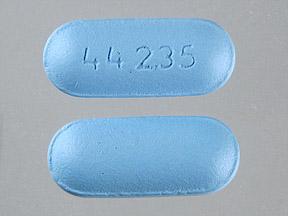 Pill 44 235 Blue Capsule-shape is Pain Reliever PM Extra Strength