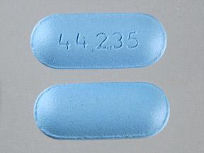 Pill 44 235 Blue Capsule/Oblong is Pain Reliever PM Extra Strength