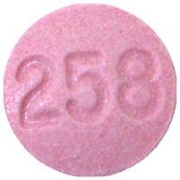 Pill 258 Pink Round is Meclizine Hydrochloride (Chewable)