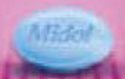 Pill Midol Blue Elliptical/Oval is Midol Extended Relief