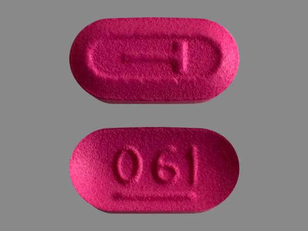 Pill T 061 Pink Capsule/Oblong is Diphenhydramine Hydrochloride