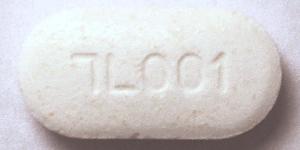 Pill 7L001 White Capsule/Oblong is Metformin Hydrochloride Extended Release