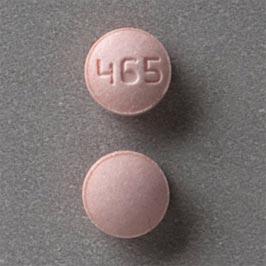 Pill 465 Brown Round is Rizatriptan Benzoate