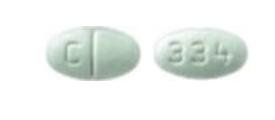 Pill C 334 Green Oval is Losartan Potassium