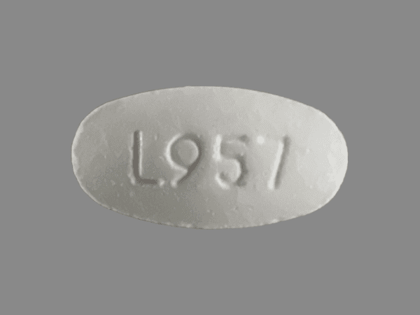 Pill L957 White Oval is Nicotine Polacrilex