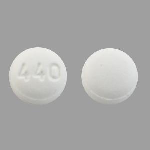 Pill 440  White Round is Donepezil Hydrochloride