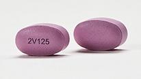 Pill 2V125 is Orkambi ivacaftor 125 mg / lumacaftor 200 mg