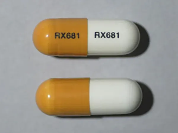 Pill RX681 RX681 White & Yellow Capsule/Oblong is Fenoprofen Calcium