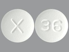 Pill X 36 White Round is Cetirizine Hydrochloride