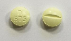 Pill n 575 Yellow Round is Methylphenidate Hydrochloride