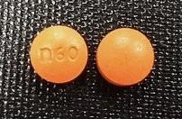 Pill n 60 Orange Round is Morphine Sulfate Extended-Release