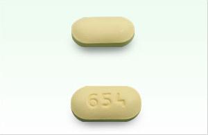 Pill 654 Yellow Capsule/Oblong is Glyburide and Metformin Hydrochloride