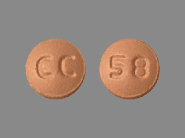 Pill CC 58 Pink Round is Famotidine