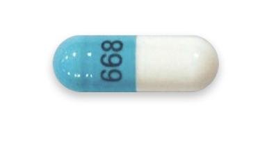 Pill 668 Blue & White Capsule/Oblong is Acyclovir