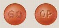 Pill OP 60 Red Round is Oxycodone Hydrochloride Extended-Release