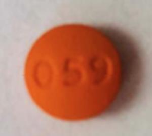 Pill 059 is Primaquine Phosphate 26.3 mg (15 mg base)