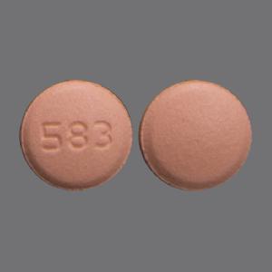 Pill 583 Pink Round is Rosuvastatin Calcium