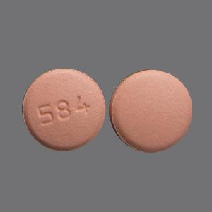 Pill 584 Pink Round is Rosuvastatin Calcium