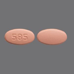 Pill 585 Pink Oval is Rosuvastatin Calcium