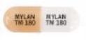 Pill MYLAN TM 180 MYLAN TM 180 Orange & White Capsule/Oblong is Temozolomide