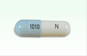 Pill 1010 N Gray & White Capsule/Oblong is Oseltamivir Phosphate