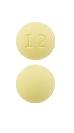 Pill I2 Yellow Round is Quetiapine Fumarate Extended-Release
