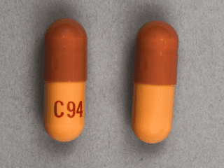 Pill C 94 Red Capsule/Oblong is Rivastigmine Tartrate