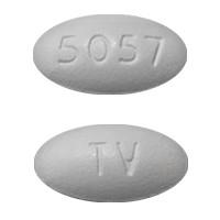 Pill TV 5057 White Oval is Atorvastatin Calcium