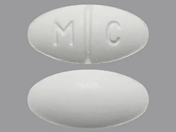 Pill M C White Oval is Meclizine Hydrochloride